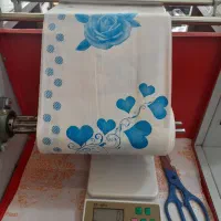 فروش طاقه سفره بصورت تکی وعمده ودستگاه رول کن