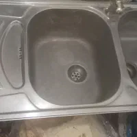 سینگ ظرفشویی. ابگرمگن زمینی. تخت خواب. هود