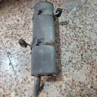 منبع اگزوز ۲۰۶ در حد نو