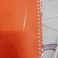 گمشده پوشه مشکی و دفترچه نارنجی رنگ. مژدگانی دارد