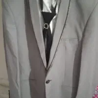 فروش یک دست کت و شلوار نوجوان.