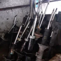 کمک جلوعقب پراید و تیبا و پژو تعمیر کمک و استوک