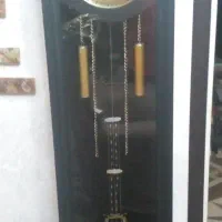 ساعت ایستاده.سالم ولی پاندولش کارنمیکنه