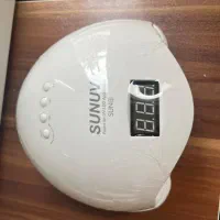 دستگاه لاک خشک کن uv sun همراه وسایل