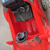 ماشین شارژی قرمز