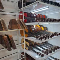 گیتار و سنتور با چک ۸ ماهه بخر