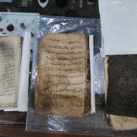 کتاب خطی و قاشق قلمدان نقره (ملواق)