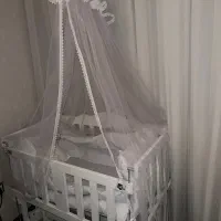 تخت کنار مادر نو نو