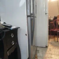 کارگر همراه ماشین لوازم خانه