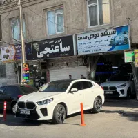 شیشه دودی خودرو در غرب تهران با در سالن سر پوشیده