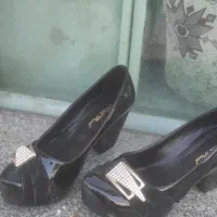 کفش مجلسی|کیف، کفش، کمربند|قم, وادی السلام|دیوار