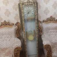 ساعت برنزایستاده