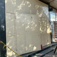 درب اندازه عرض۴متر ارتفاع ۳.۶۰وزنش ۴۵۰کیلو