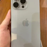 ایفون 15 پرومکس نچرال تیتانیوم همراه با قاب هدیه