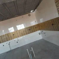 کارگر کاشی کاری وارد برای ملات و دوغاب ریزی