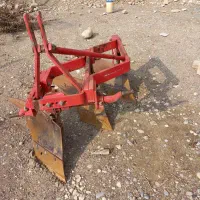 تراکتور و بیل و گاوآهن