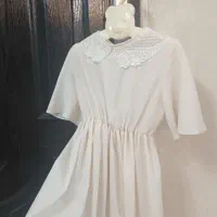 لباس بچگانه|کفش و لباس بچه|قم, قلعه یزدیها|دیوار