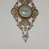 ساعت دیواری برنجی سیاه قلم درحدنو