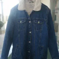 کت لی (جین)، استوک و تاناکورا|لباس|شیراز, جانبازان|دیوار