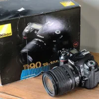 دوربین عکاسی نیکون Nikon D90 lenz 18-105