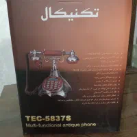 یک جارو برقی صطلی نو بایگ ثلفن رو میزی نو