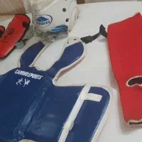 لوارم مبارزه تکواندو وشوو هوگو کلاه ساق بند