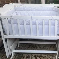 تخت کنار مادر گهواره ای
