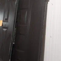 درب آپارتمانی دو لنگه به همراه ففل و دستگیره