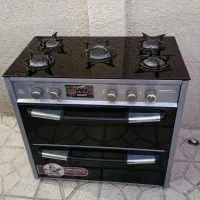 اجاق گاز صفحه ای نونو و کابینت 2 درب