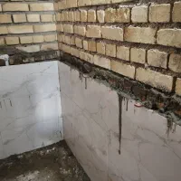 تخریب و بازسازی اجرای کاشی نما موزاییک