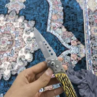 چاقو دکمه ای