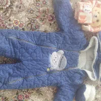 گهواره و کاپشن نوزاد
