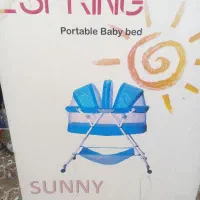 گهواره چرخ دار صورتی