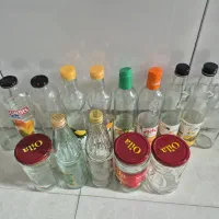 تعدادی بطری و شیشه نو