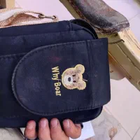 یک کارت عابر وکیف و ادکلن