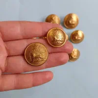 مجموعه شیر و خورشید ( دکمه ها و سکه های پهلوی )