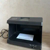دستگاه تشخیص اسکناس جعلی