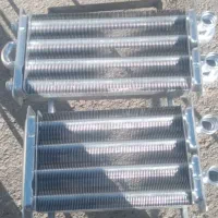 تعمیر انواع مبدل های ایرانی وخارجی|آبگرمکن، پکیج، شوفاژ|سنندج, |دیوار