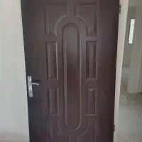 درب چوبی و کم آهنی مربوط به همان در