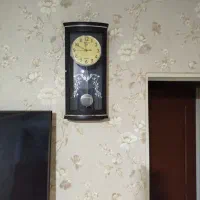 ساعت. میز تلفن. مجسمه کورش کتیبه