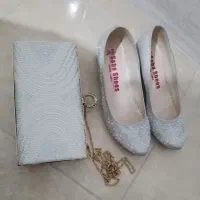 کفش نو|کیف، کفش، کمربند|قم, سنگ بند|دیوار