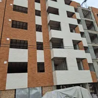 اجرای نمای ساختمان سنگ وآجر وکاشی