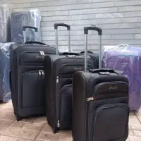 چمدان برزنتی دوچرخ وچهار چرخ