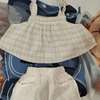 تعدادی لباس بچگانه دخترانه و پسرانه