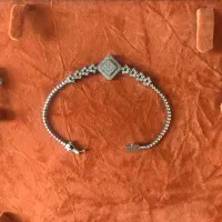 گوشواره و دستبند طلا