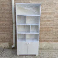 کتابخانه یه تومن زیر قیمت