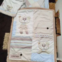 سرویس رختخواب نوزاد ۴تکه همراه با پتوی دور پیچ
