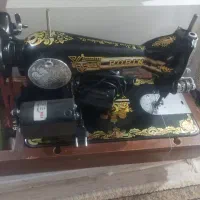 چرخ قدیمی|چرخ خیاطی و ریسندگی|شیراز, کوشک میدان|دیوار