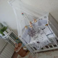 گهواره کنار مادر