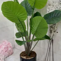 ۴ تا درختچه گل مصنوعی وبا گلدون نخل وانجیر وپرنده